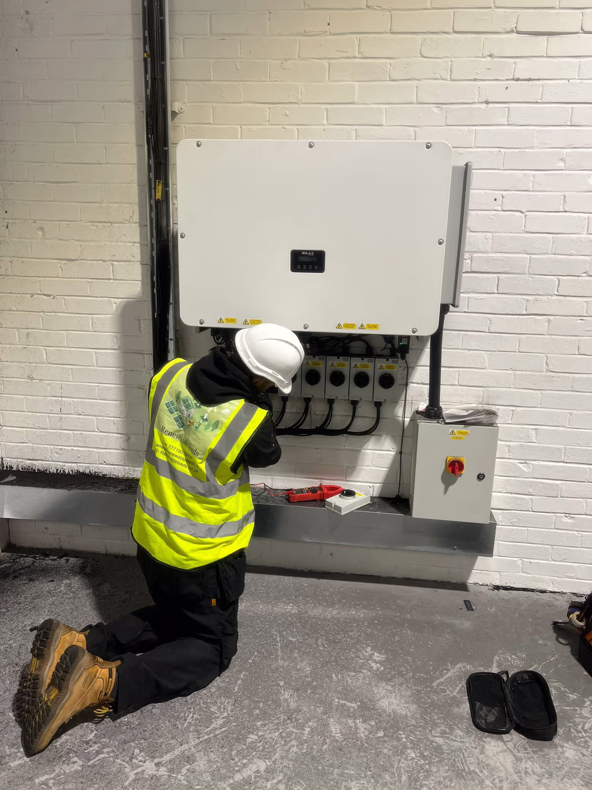 Renewable Leeds engineer commissioning an inverter